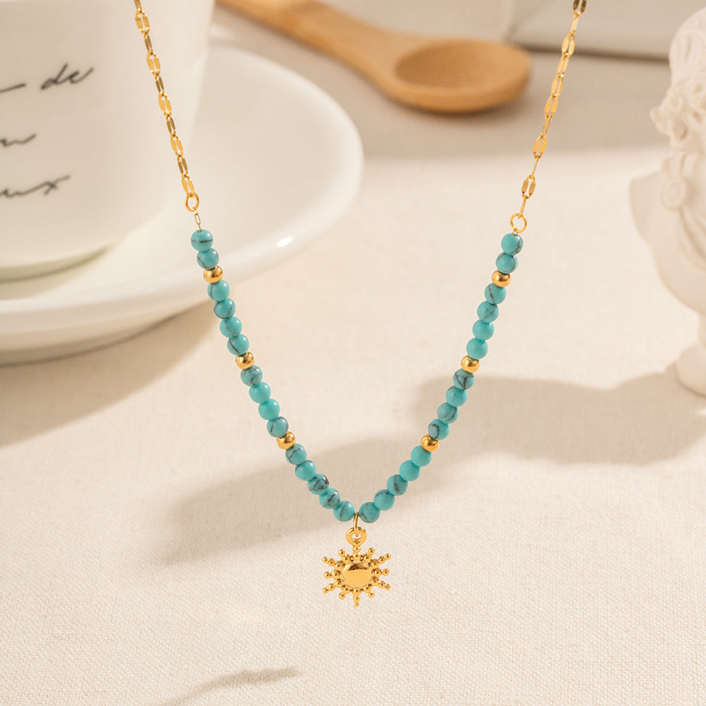 Collar de sol con beads turquesa | dorado