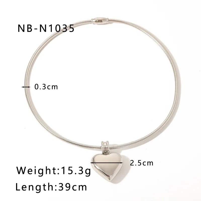 Amor con Charms ⭐- Choker con corazón plateado y Pulsera con charms