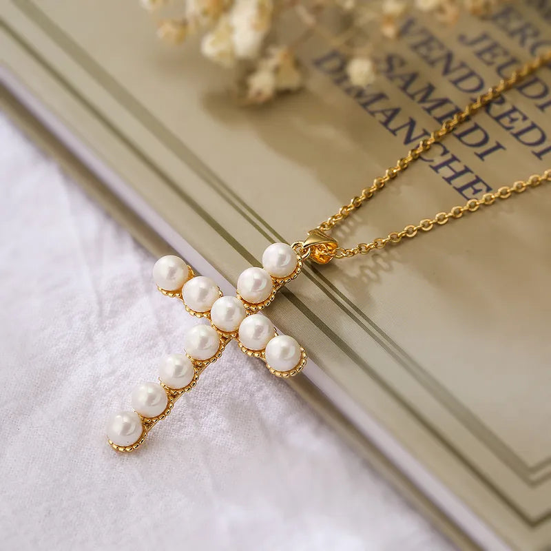 Collar cruz con perlas | dorado