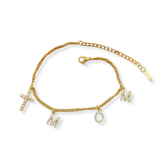 Pulsera mom con zirconias y cruz | dorada