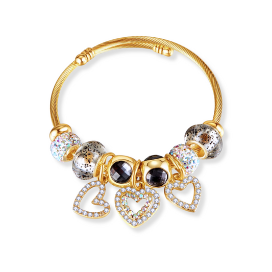 Bangle con charms de corazones | dorado