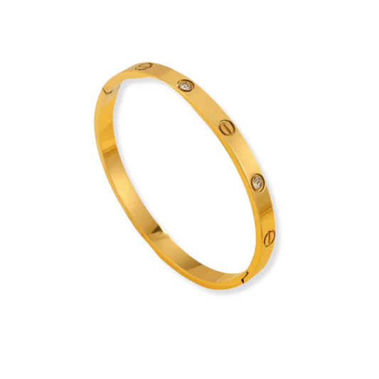 Bangle con zirconias y relieve | dorado