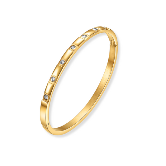 Bangle con zirconias redondas | dorado