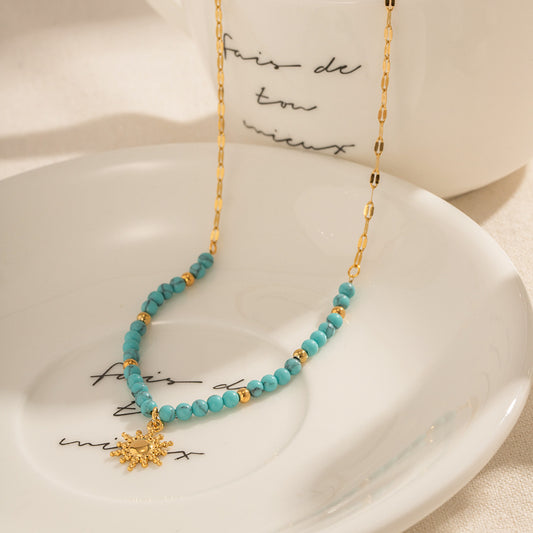 Collar de sol con beads turquesa | dorado
