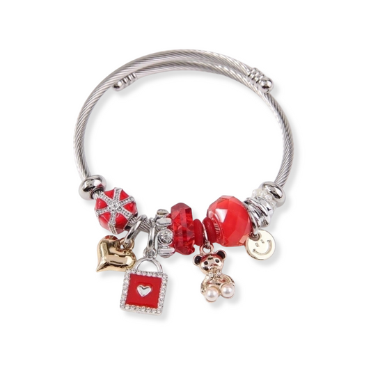 Bangle con charms | osito, cara feliz y otros